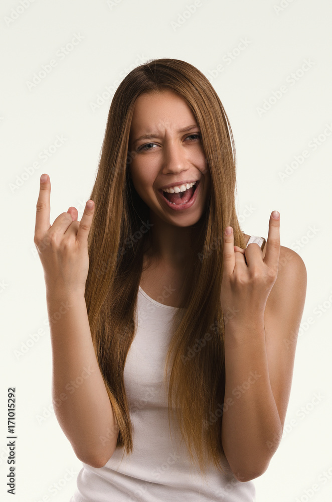 Beautiful woman gesticulating. Casual girl portrait. Young attractive woman. Studio shot. Beautiful woman gesticulating. Casual girl portrait. Young attractive woman. Studio shot.