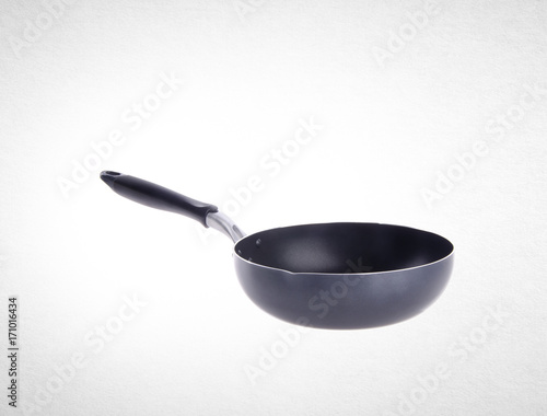 pan or metal frying pan on a background.