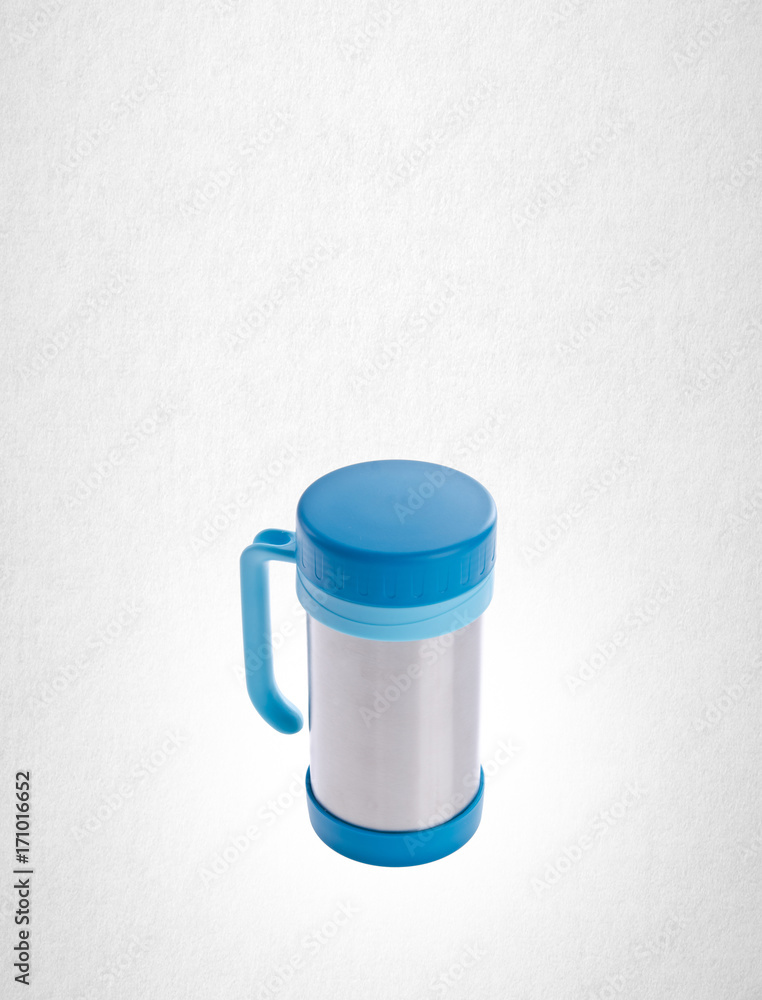 Thermo cup or stainless steel thermo cup on a background. Thermo cup or stainless steel thermo cup on a background.