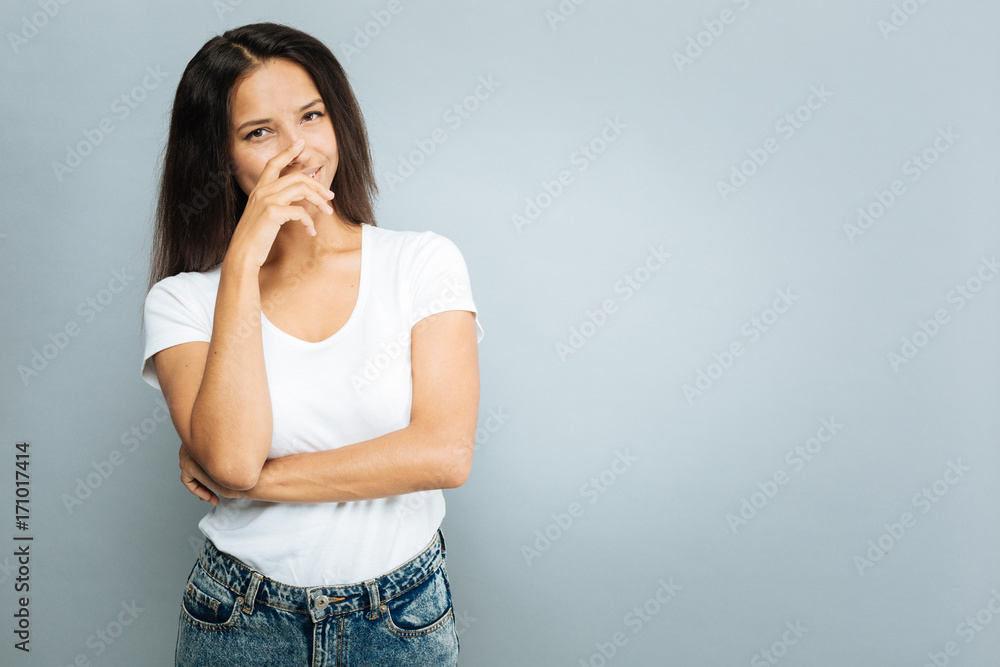 Charming girl looking straight at camera Charming girl looking straight at camera