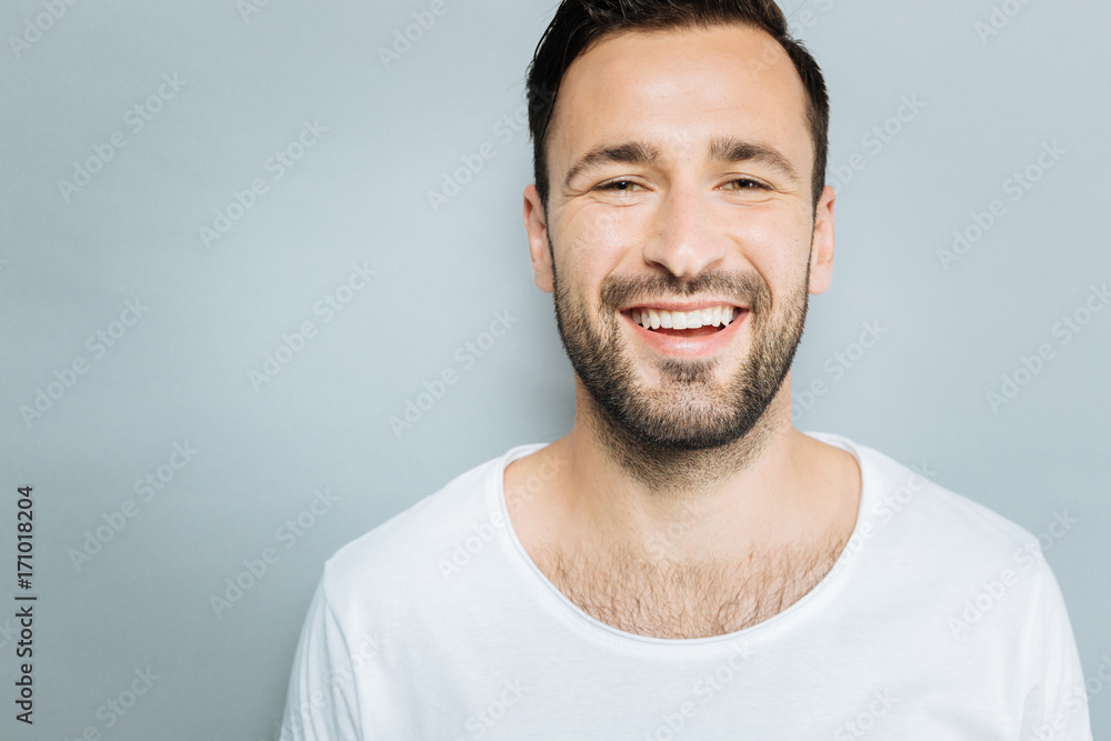 Portrait of delighted male person that looking at camera Portrait of delighted male person that looking at camera