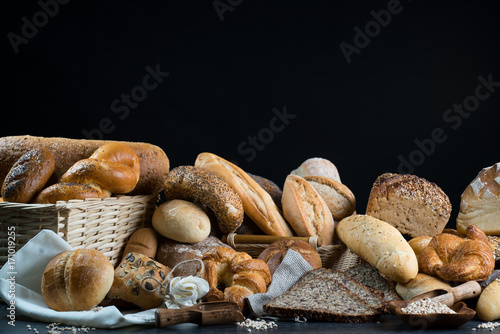 Different bread and bread slices, food background.