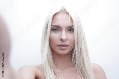 close-up face of serious beautiful blond woman