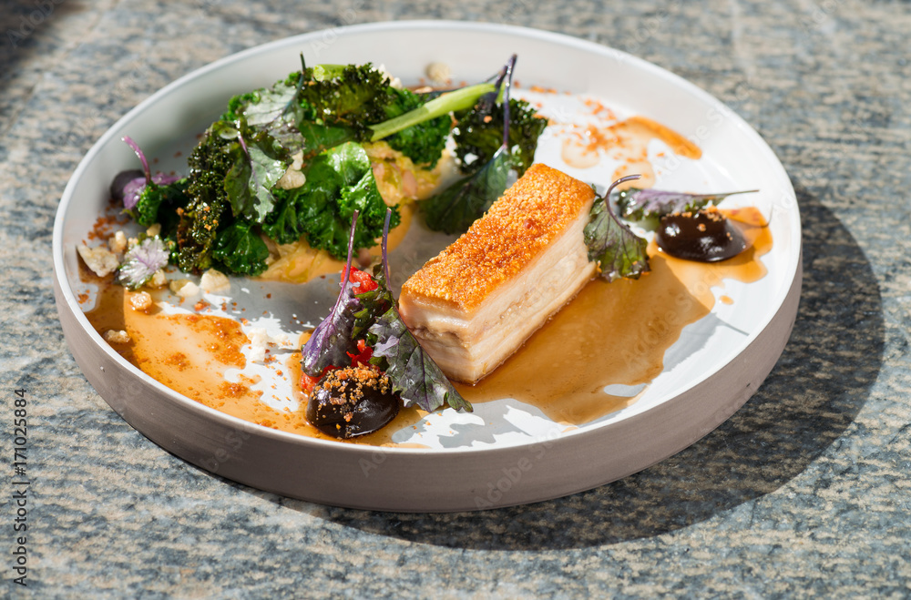 Plated freshly grilled pork belly with vegetable Plated freshly grilled pork belly with vegetable