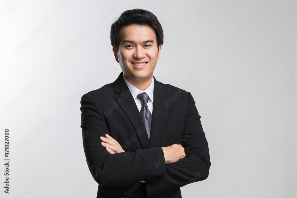 Young asian handsome businessman in black suit Young asian handsome businessman in black suit