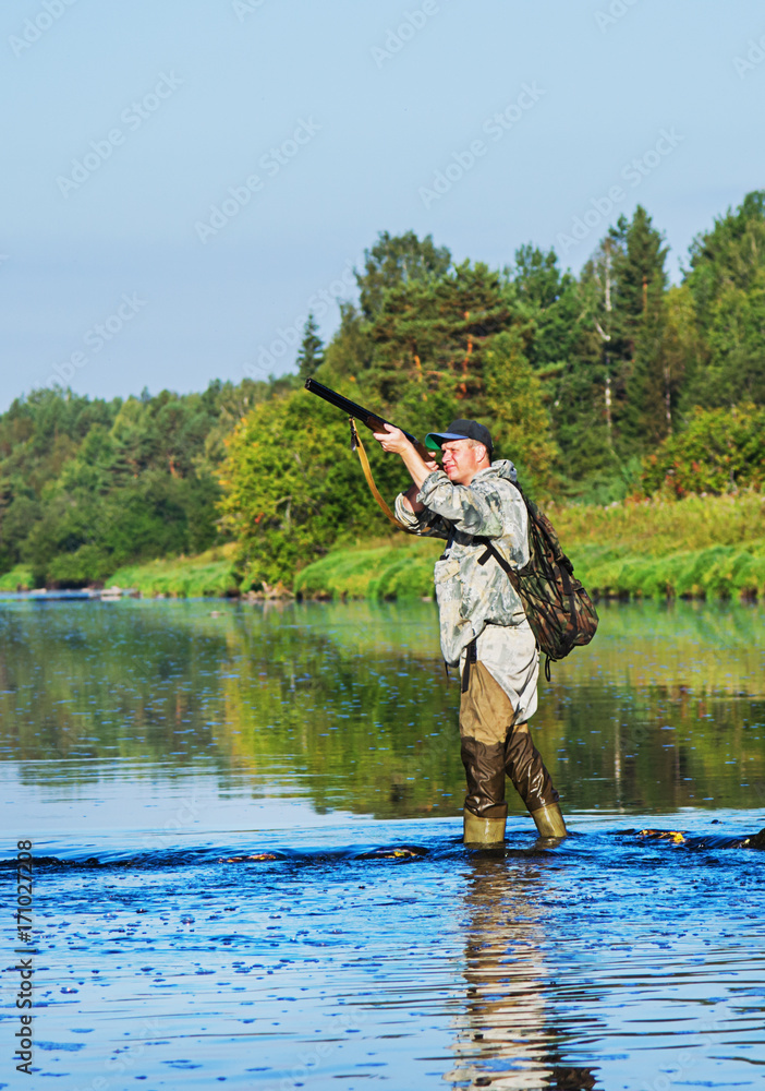 Hunter hunting duck