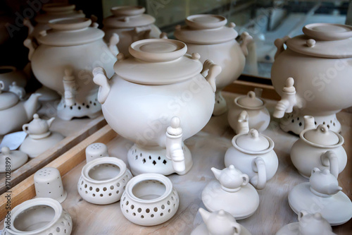 White unpainted earthenware teapots