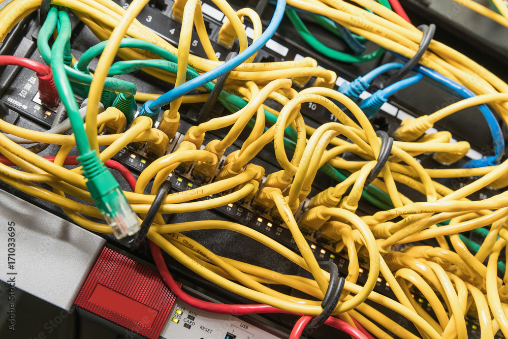 Fber optic with servers in a technology data center . Fber optic with servers in a technology data center .