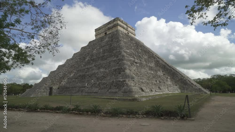 CHICHEN ITZA, MEXICO - MAY 25, 2017: Maya pyramid temple Kukulkan in peninsula Yucatan at cloudy summer day CHICHEN ITZA, MEXICO - MAY 25, 2017: Maya pyramid temple Kukulkan in peninsula Yucatan at cloudy summer day