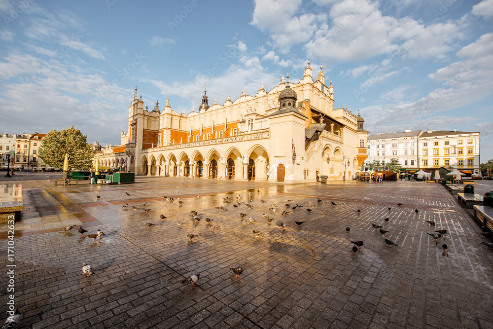 Cityscape view on the Market square with Cloth Hall building during the morning light in Krakow, Poland