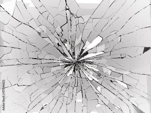 Bullet hole and pieces of shattered or smashed glass