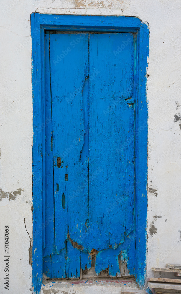 Blue aged door from Sidi Bou Said in Tunisia