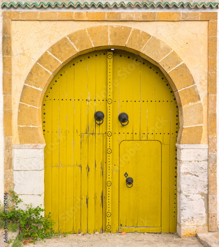 Yellow gates with door and ornament from Sidi Bou Said