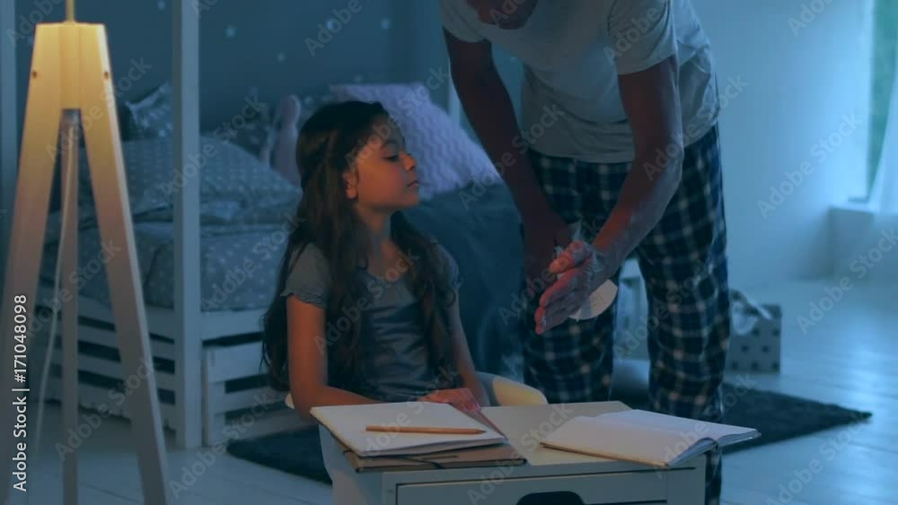 Strict father punishing his little daughter Strict father punishing his little daughter