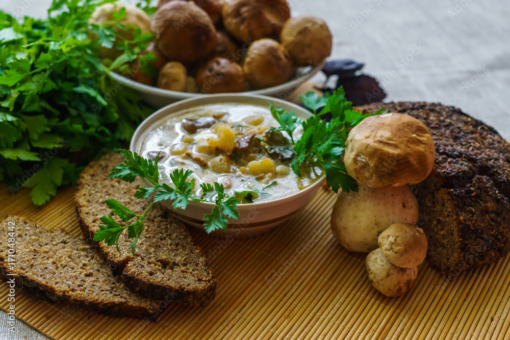A village lunch of soup with borers, along with sour cream, rye bread and greens. A village lunch of soup with borers, along with sour cream, rye bread and greens.