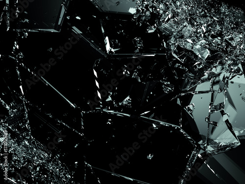 Pieces of splitted or cracked glass on black