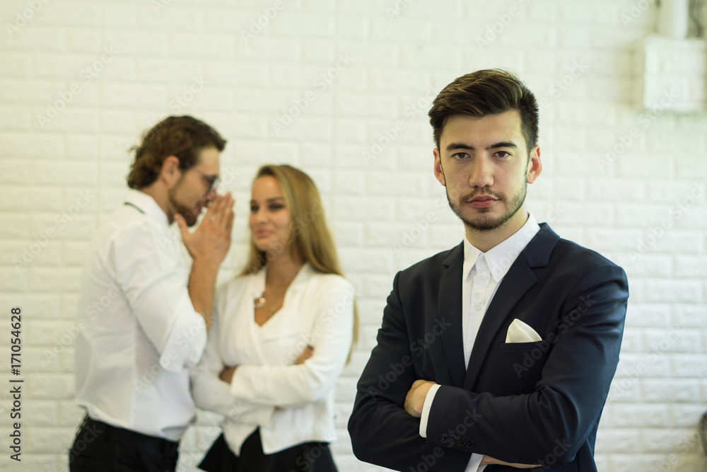 Confident businessman with team business behind. Confident businessman with team business behind.