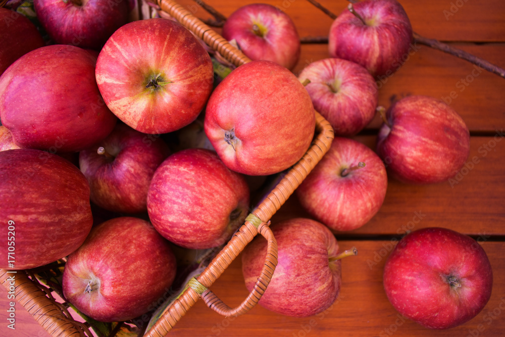 Red apples in a basket, autumn harvest. Red apples in a basket, autumn harvest.