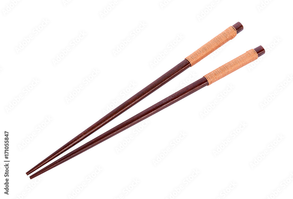 Wooden pairs of chopsticks on white background Wooden pairs of chopsticks on white background