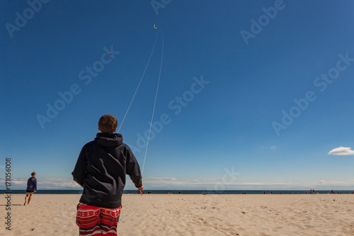 Go fly a kite kids on the beach