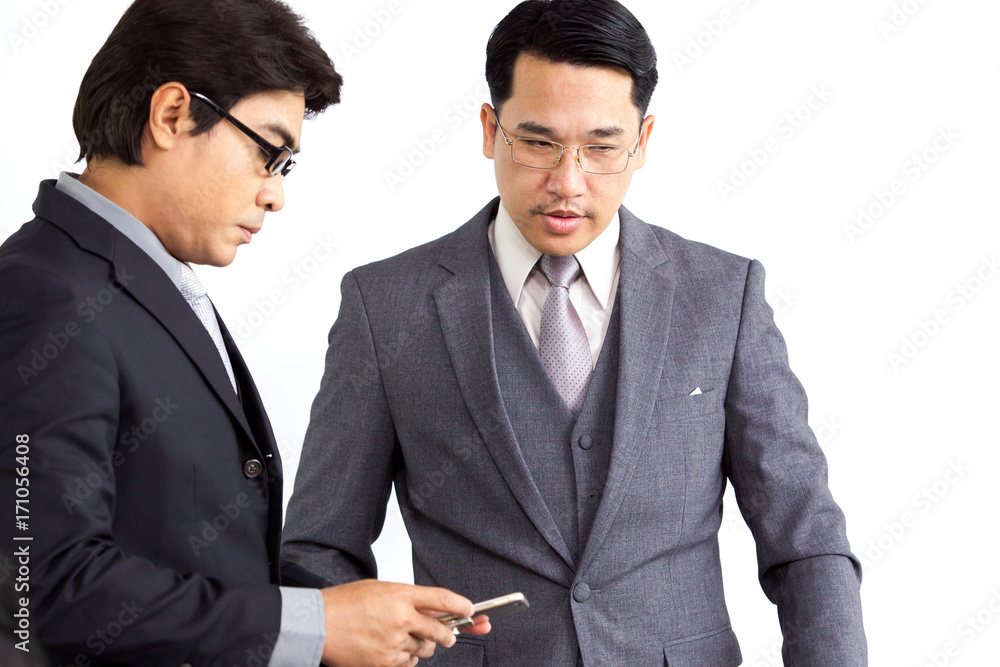 Portrait of senior CEO in suit age between 40-45 years old on solid white background. Portrait of senior CEO in suit age between 40-45 years old on solid white background.