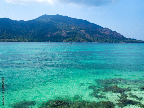 Crystal turquoise green sea ocean clear water and mountain at Lipe Island  Satun  Thailand.