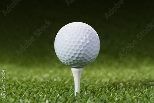 Golf ball on the green with copy space