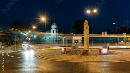 Roundabout and the church in Zory in the evening