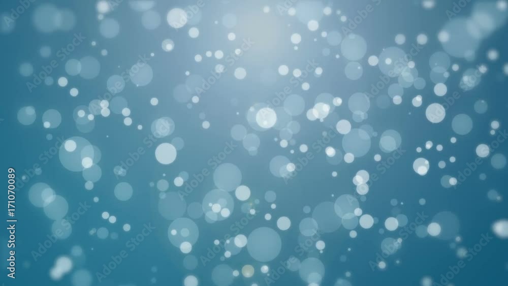Animated bokeh background with glowing light particle floating against blue backdrop. Animated bokeh background with glowing light particle floating against blue backdrop.