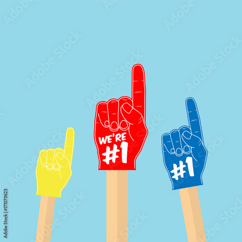 Football fans. Raised hands wearing foam fingers.
