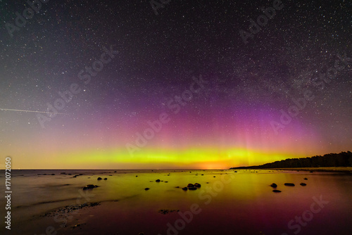 Intense northern lights (Aurora borealis) over Baltic sea