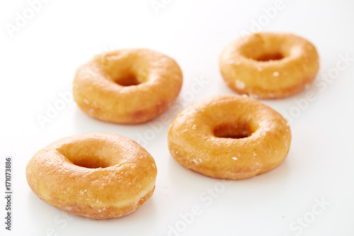 Glazed donutson a white Background © 1981 Rustic Studio