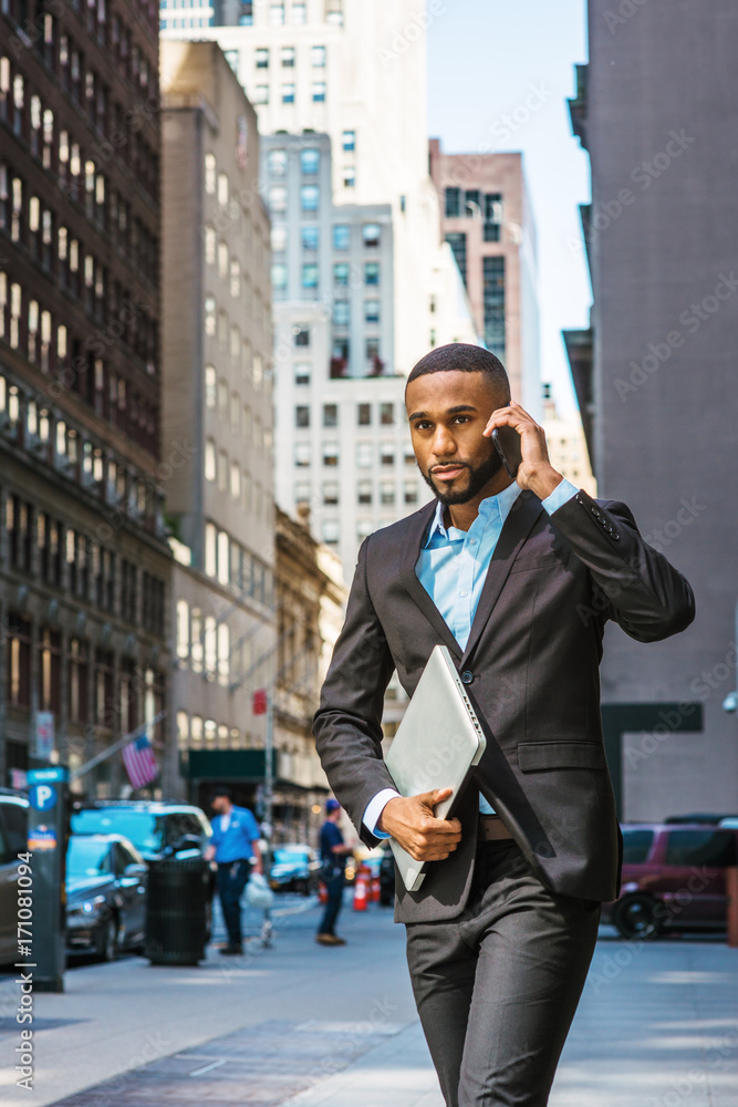 Young African American businessman traveling, working in New York