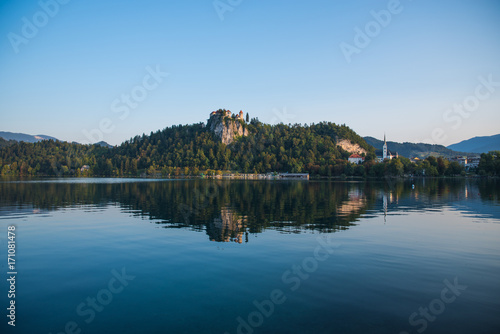 Castle on the hill above a beautiful natural lake
