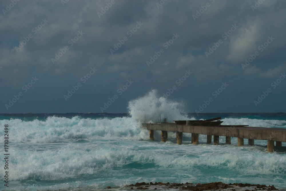 Hurricane Irma as she passes through the Caribbean. This shot was taken from the coastline of Grand Cayman where the stormy conditions created a violent ocean. 