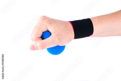 hand with kinesiology tape and stressball. Physiotherapy and therapeutic tape for wrist pain, aches and tension. elastic therapeutic tape. adhesive tape and alternative medicine.