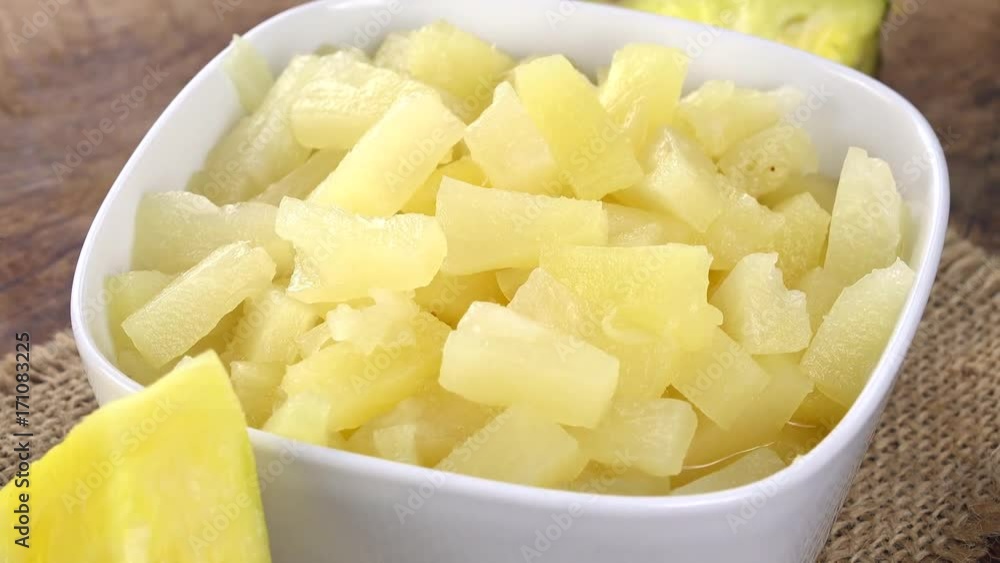Homemade Pineapple pieces (preserved) (rotating) as detailed 4K UHD footage (seamless loopable) Homemade Pineapple pieces (preserved) (rotating) as detailed 4K UHD footage (seamless loopable)