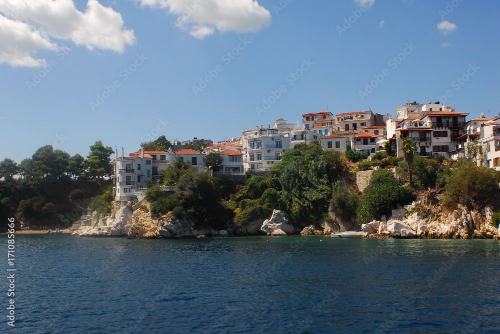Skiathos town on Skiathos Island, Greece. Beautiful view of the old town with boats in the harbor.