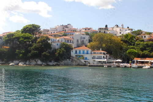 Skiathos town on Skiathos Island, Greece. Beautiful view of the old town with boats in the harbor.