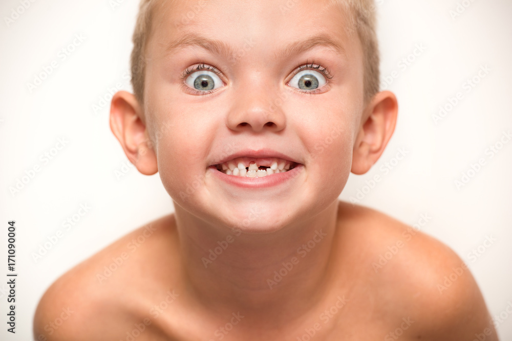 The little boy falls out a baby tooth.Child waits for the tooth fairy. The little boy falls out a baby tooth.Child waits for the tooth fairy.