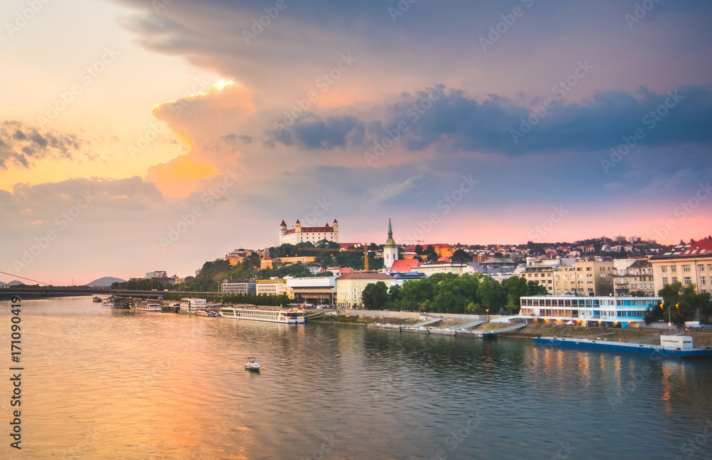 Cityscape of Bratislava, Slovakia at Sunset  as Seen from a Bridge over Danube River Towards Old Town of Bratislava.