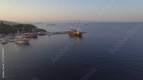 Aerial view of old ship parked on the port/ Drone flight