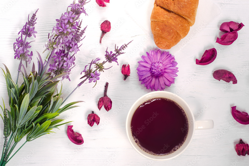 Flowers cup of tea croissant Flowers cup of tea croissant