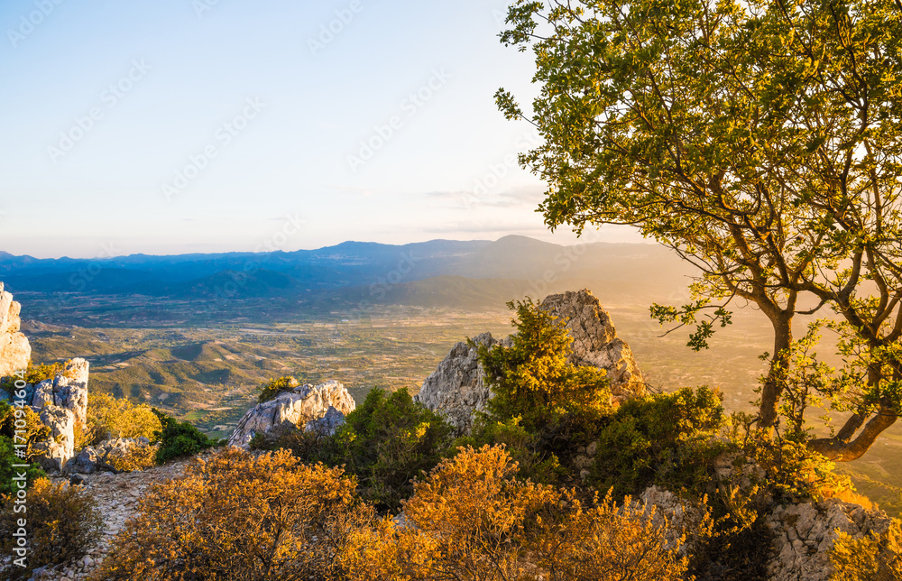 View from mountain panoramic valley landscape at sunset in Sardinia, Italy.
