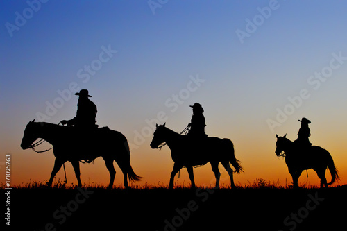 Silhouette of Cowboys and Cowgirls