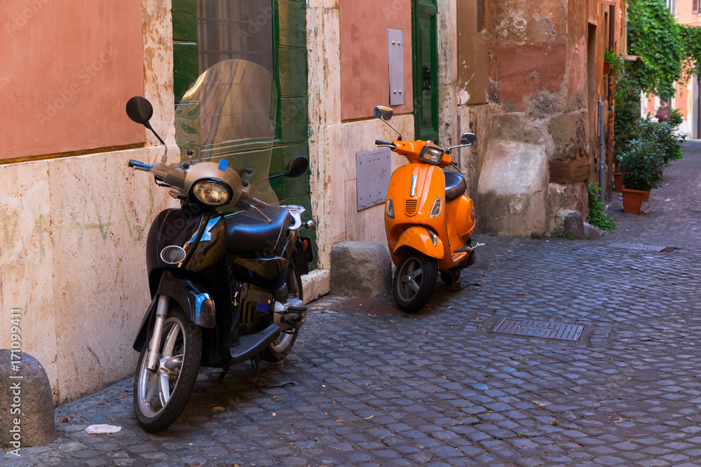 old town italian street with bykes in Trastevere, Rome, Italy