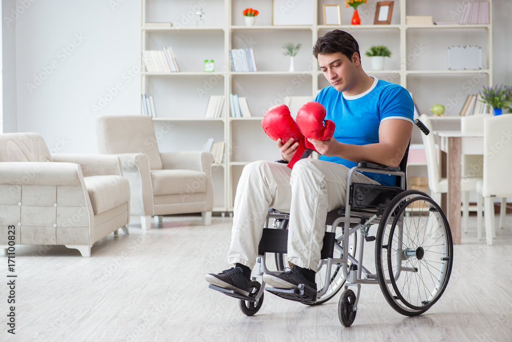 Disabled boxer at wheelchair recovering from injury Disabled boxer at wheelchair recovering from injury