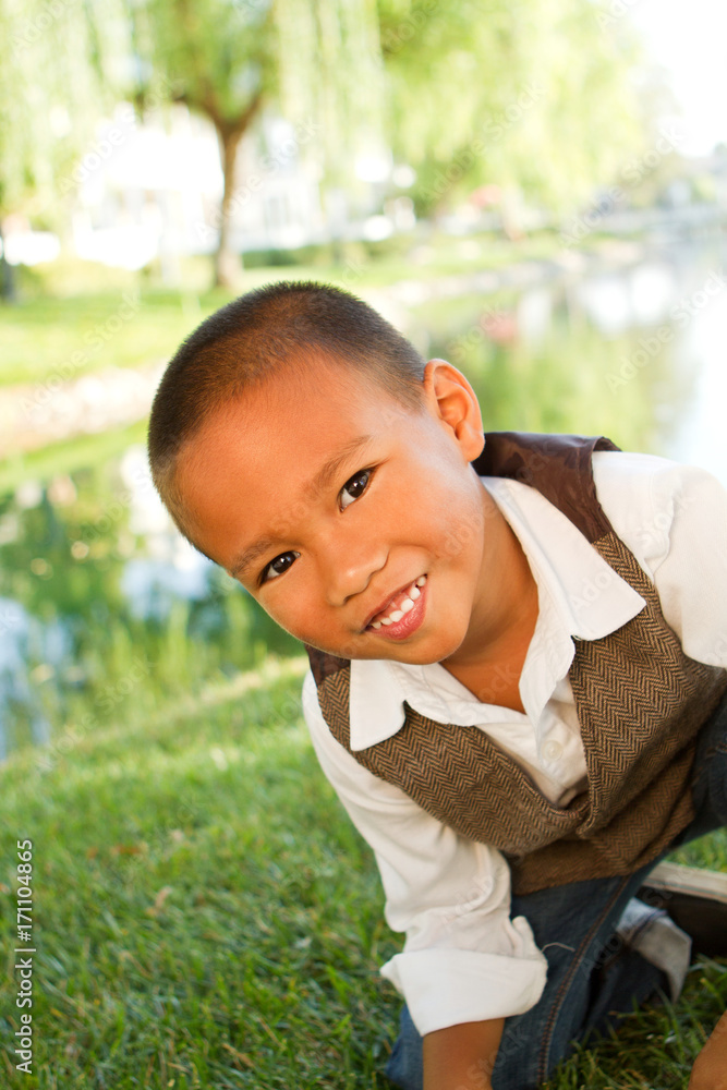 Obraz premium Happy Asian little boy.