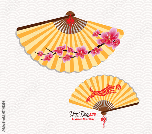 Classic Chinese new year blossom and oriental folding Paper Fan. Year of the dog. Chinese character hieroglyph: Dog