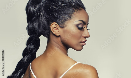 Beautiful profile shot of exotic young woman